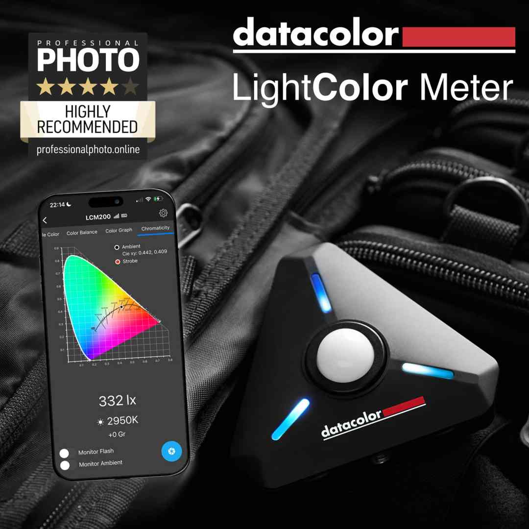 a datacolor lightcolor meter placed on a black bag with a smartphone displaying a color analysis chart and lux measurement on the side the device has three colored buttons and a central dial digital production A datacolor LightColor Meter placed on a black bag, with a smartphone displaying a color analysis chart and lux measurement on the side. The device has three colored buttons and a central dial.